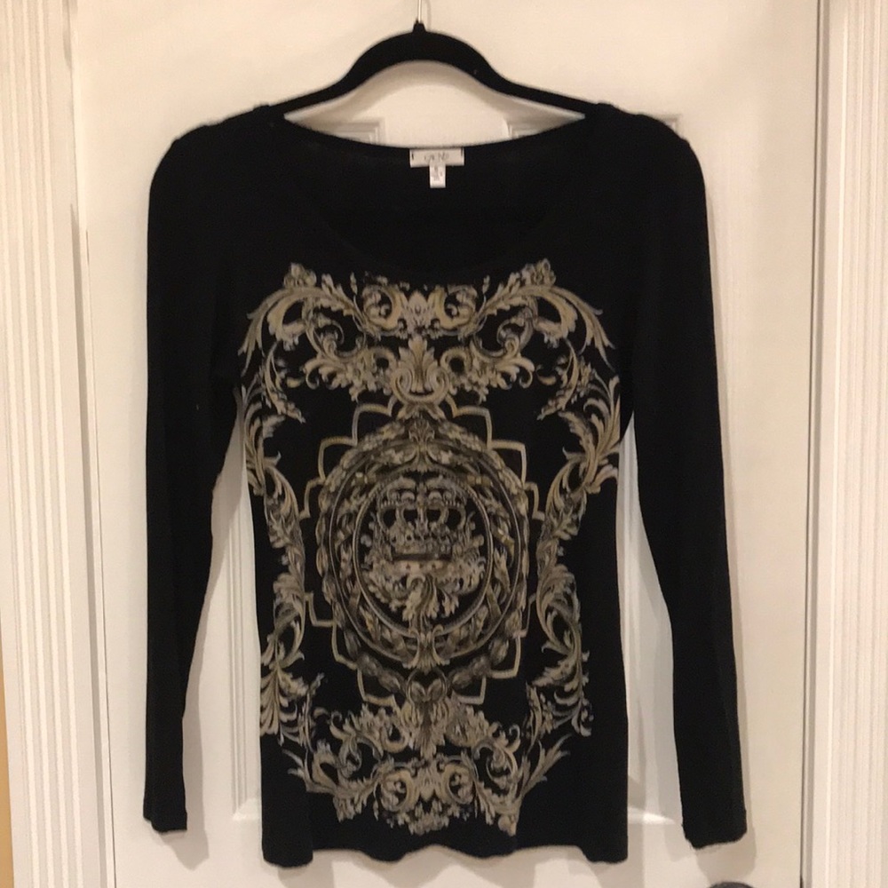 Cute Cache top wore once. Looks great with jeans.